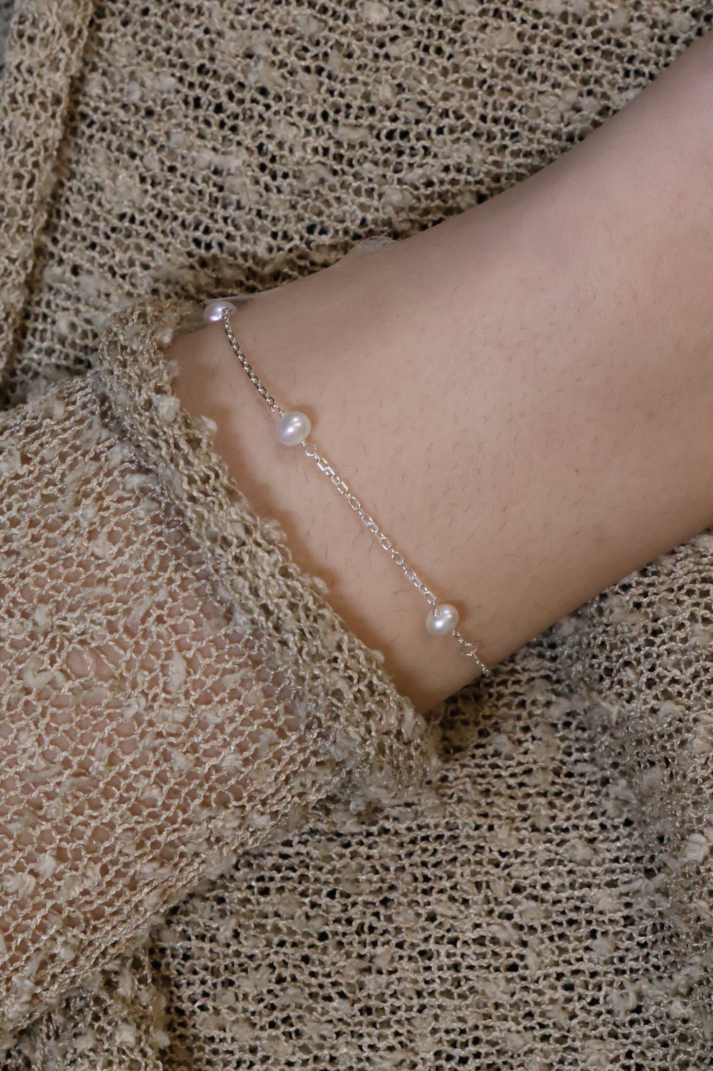 Personalisierte Armkette mit Perlen