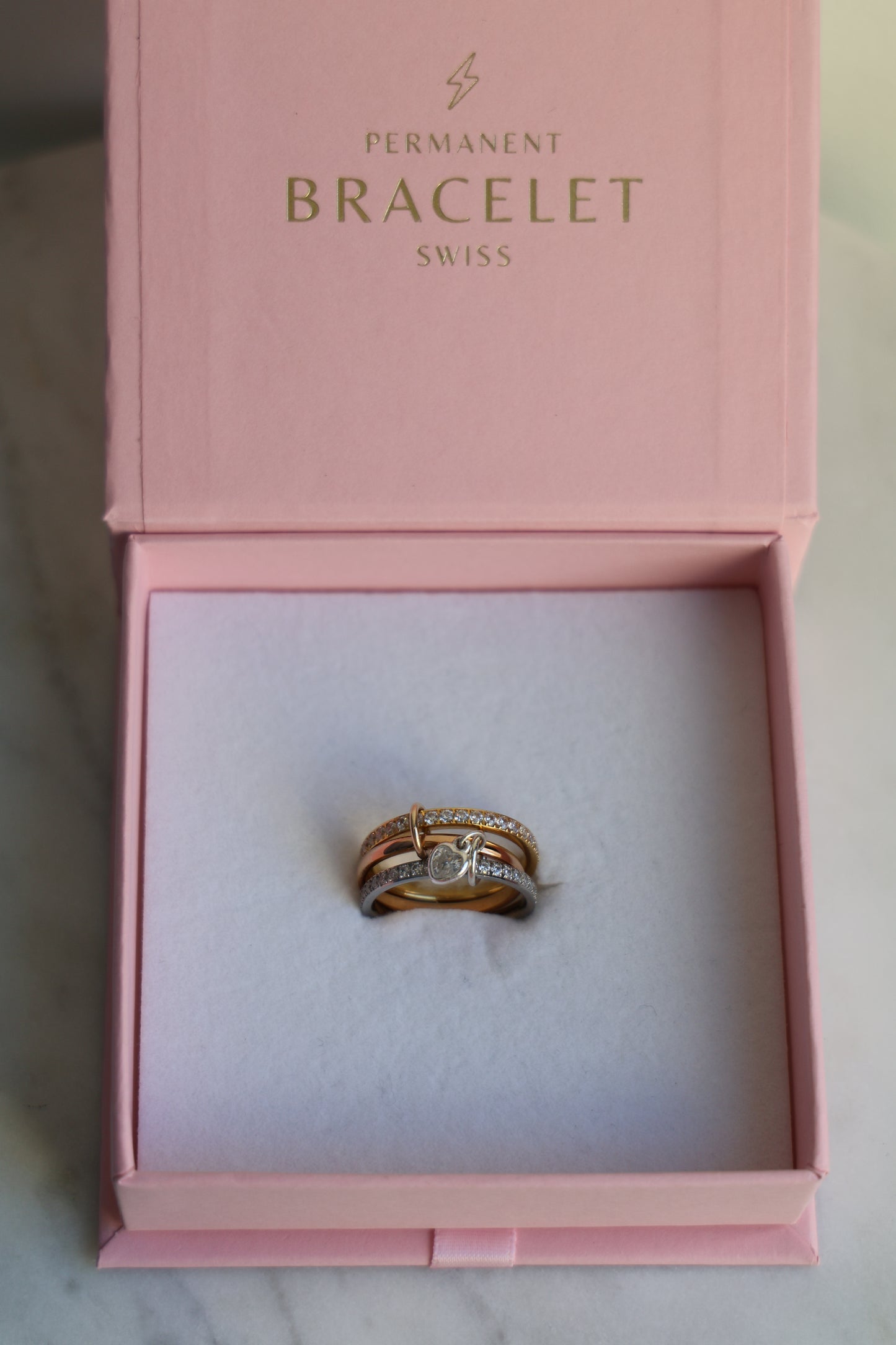 Connected Ring Gold, Silber & Rosegold mit Herz-Charm